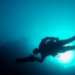 scooter diver with sunrays